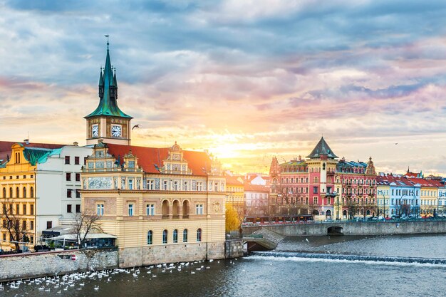 Beautiful view of the Old Town and Vltava river at sunrise in Prague, Czech Republic