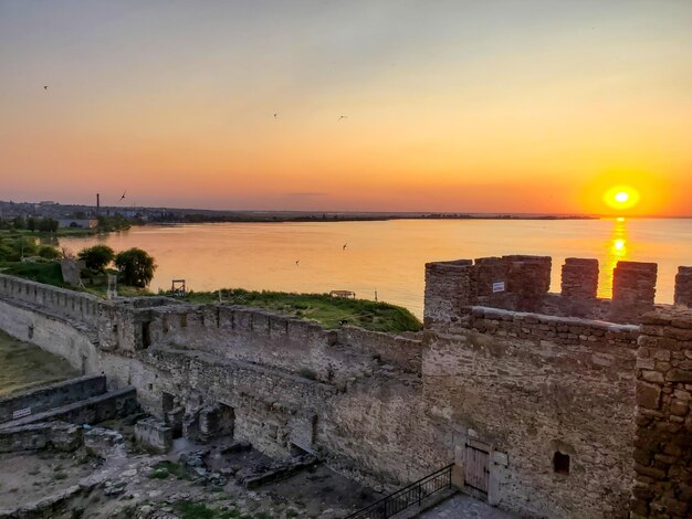 Beautiful view of the river at sunset from the fortress wall fortress BelgorodDnestrovsk Ukraine