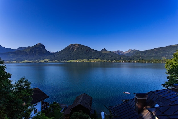 Beautiful view on Santz Wolfgang on alps mountains lake Wolfgangsee blue sky Salzburg Austria