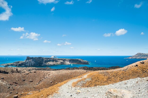 Beautiful view of the sea and islands. Volcano near the Santorini island, Greece.