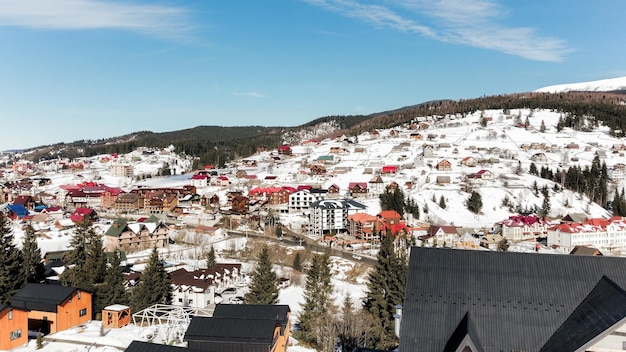 Beautiful view of the snowy city in the mountains Snowy cold day frosty weather season snow winter day