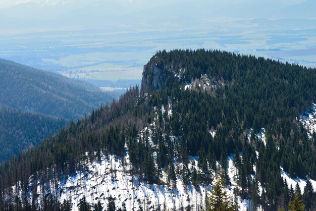 Beautiful view of the snowy mountains with blue sky ,  during sunny day in spring. West Tatras.