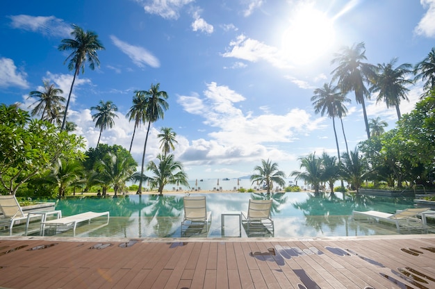 Beautiful view of swimming pool with Green tropical garden in cozy resort, phi phi island, Thailand