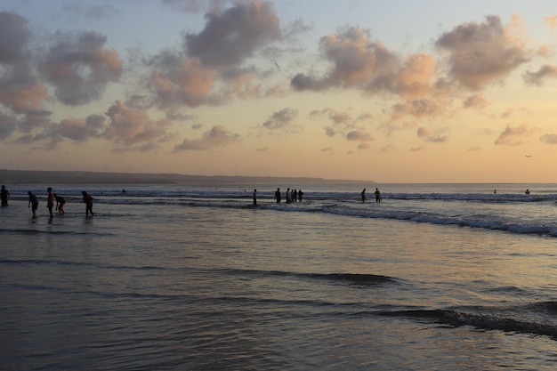 A beautiful view of tourists in Kuta Beach Bali Indonesia