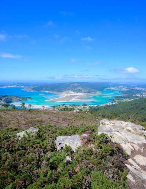 Beautiful view of a turquoise river with a deep blue sky Galicia Spain