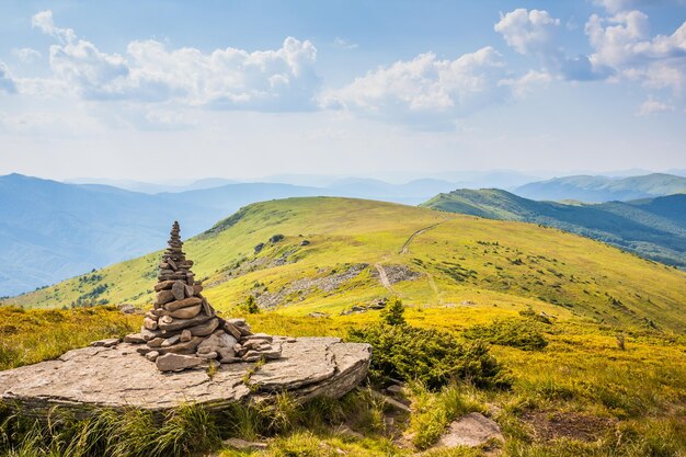 Beautiful view of the Ukrainian mountains Carpathians and valleys Stone path and green mountains