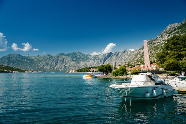 Beautiful view with white yacht in the port of Kotor