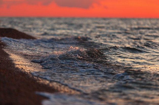 Beautiful warm light over the sea after sunset.