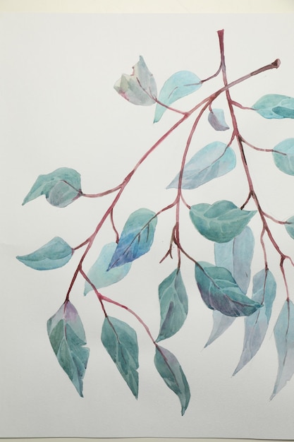 Beautiful watercolor tropical leaves painted on white paper top view