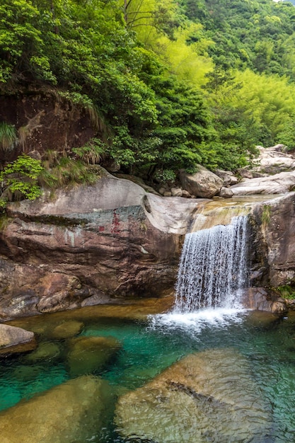 Beautiful waterfall in forest Anhui province China One of the scene from movie Crouching Tiger Hidden Dragon