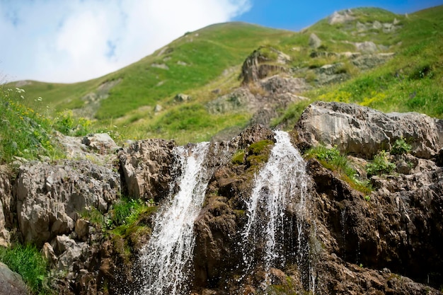 Beautiful waterfall on the mountain with blue sky Waterfall in tropical highlands