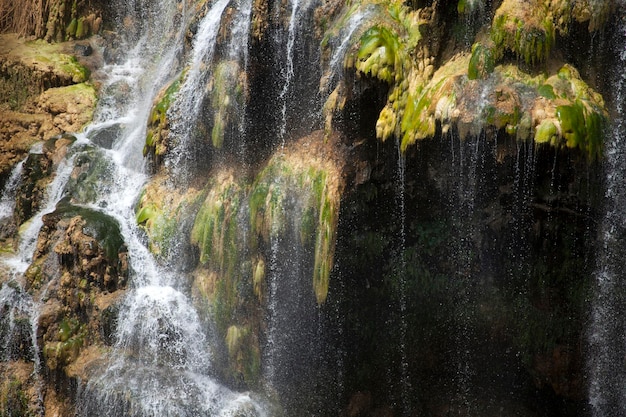 Beautiful waterfall photo background rocky field