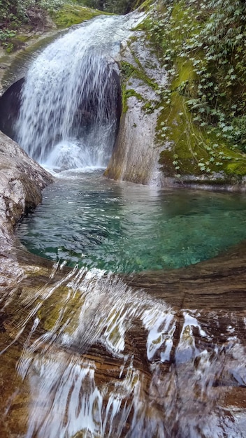 Beautiful waterfall with crystalline waters in Penedo Rio de Janeiro Brazil