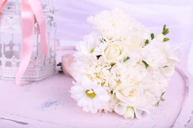 Beautiful wedding bouquet on chair