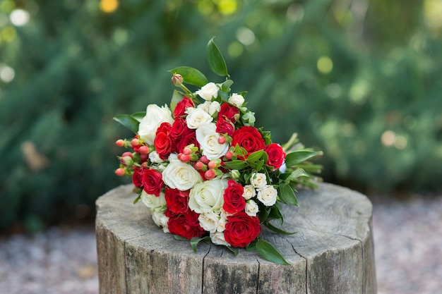 Beautiful wedding bouquet of red and light roses