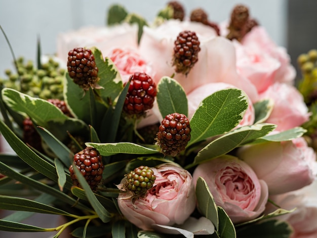 Beautiful wedding bouquet of shrub and peony gently pink roses.