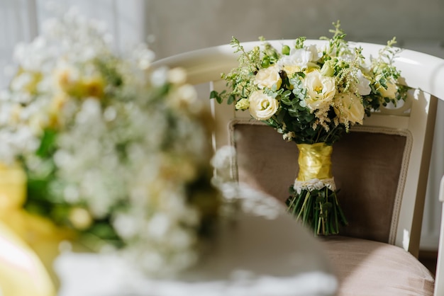 Beautiful wedding bouquet with fresh flowers on a wedding day