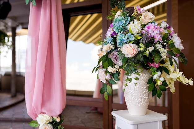 Beautiful wedding decorations for the ceremony outside in sunny weather