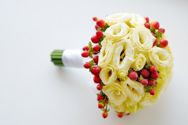 Beautiful wedding flowers bouquet on white 