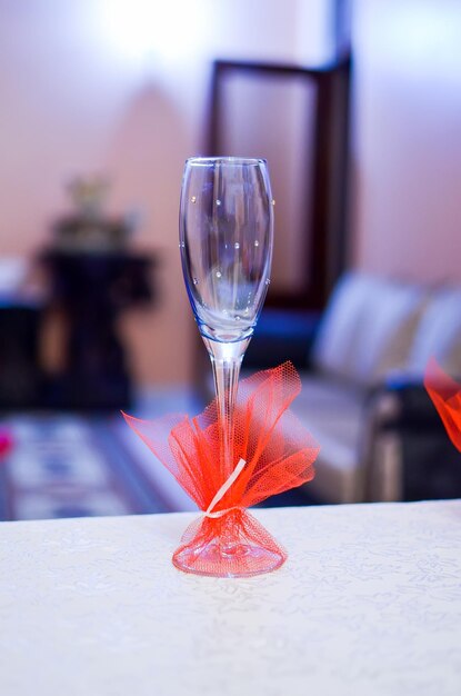 Beautiful wedding glass with a red ribbon