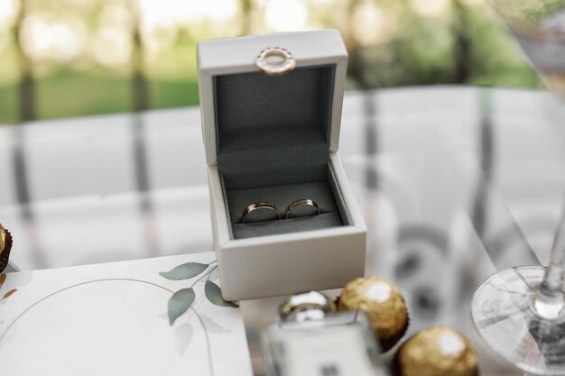 Premium Photo | Beautiful wedding rings in a box