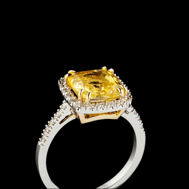 Bellissimo anello in oro bianco con zaffiro giallo e diamanti su fondo nero