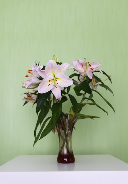 Beautiful white lily flowers in a bouquet Elegant floral decor