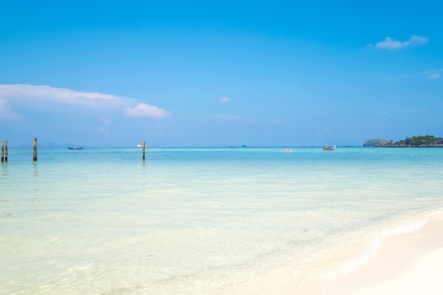 Beautiful white sand beach with soft ocean wave in summer time concept travel.