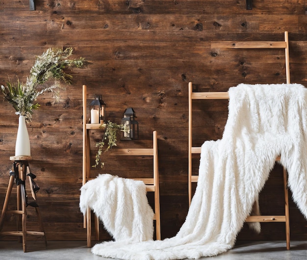 beautiful white towels and candles in a wooden sauna