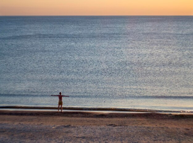 Beautiful winter sunset on the sandy beach of the Baltic Sea in Lithuania Klaipeda