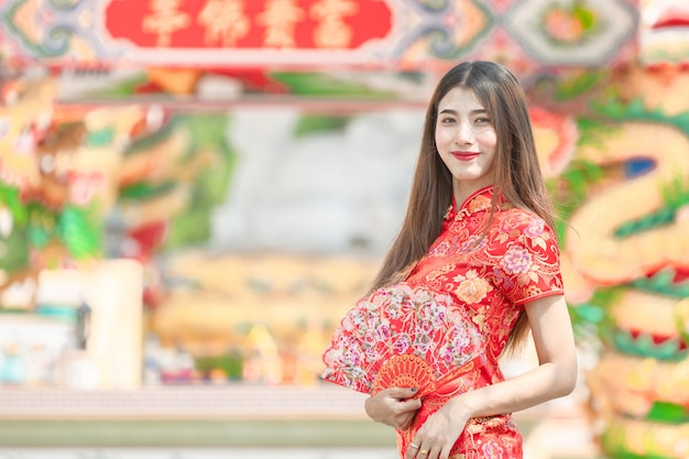 Photo beautiful woman asian wearing red dress