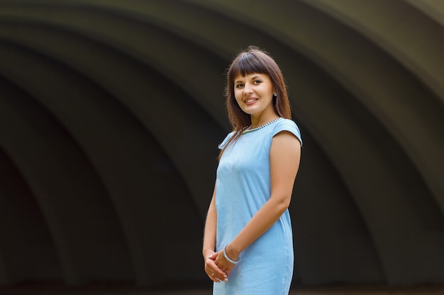 Beautiful woman in a blue dress