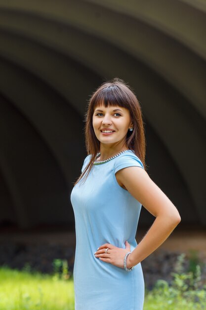 Beautiful woman in a blue dress