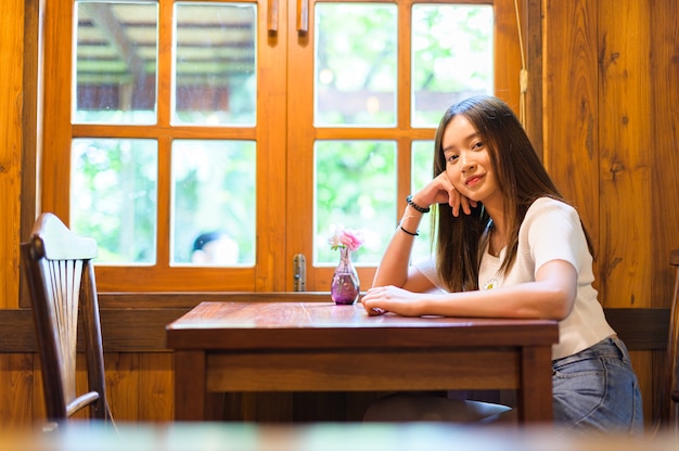 Beautiful woman at a cafe shop