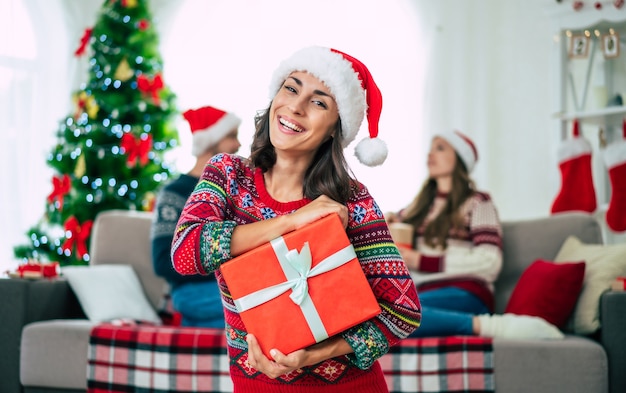 beautiful woman in a Christmas Santa hat