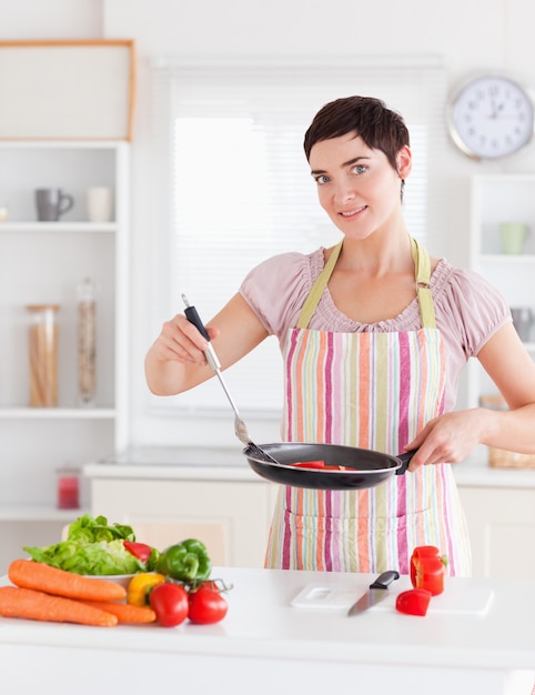 Beautiful woman cooking 