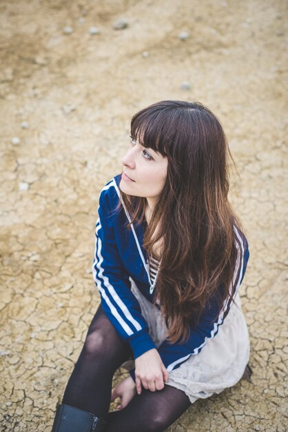 beautiful woman in a desolate landscape