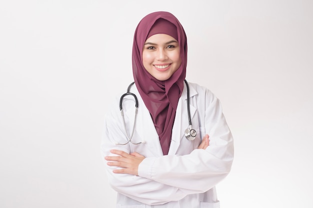 Beautiful woman doctor with hijab portrait on white background