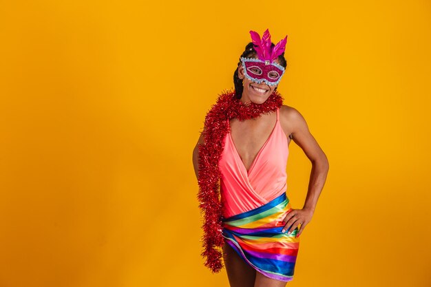 Beautiful woman dressed for carnival night. Afro woman with carnival makeup