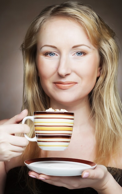 Beautiful woman drinking coffee