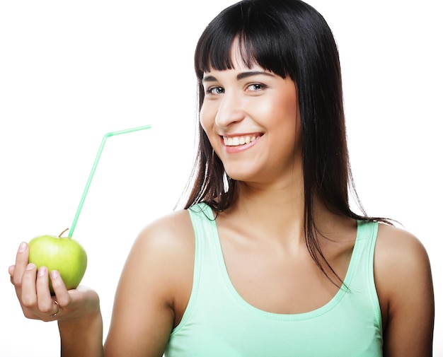 Beautiful woman drinking juice with straw