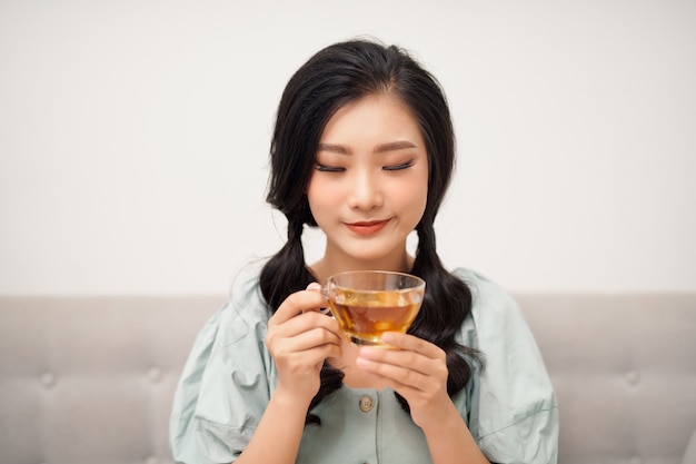 Beautiful Woman Drinking Tea From Cup