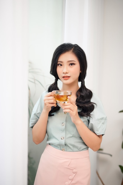 Beautiful Woman Drinking Tea From Cup