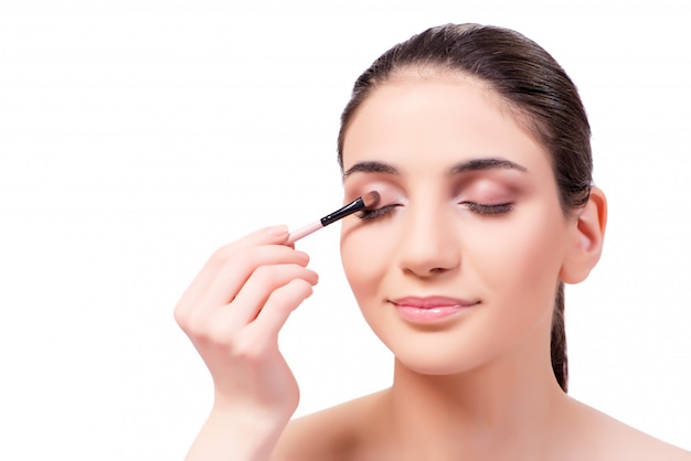 Bella donna durante la sessione di cosmetici trucco