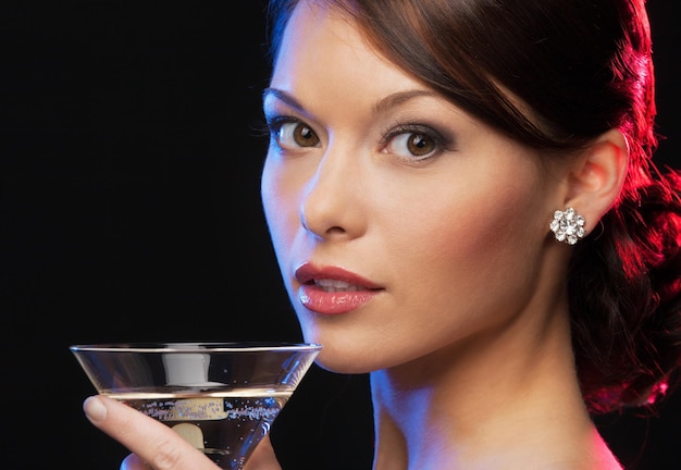 beautiful woman in evening dress with cocktail