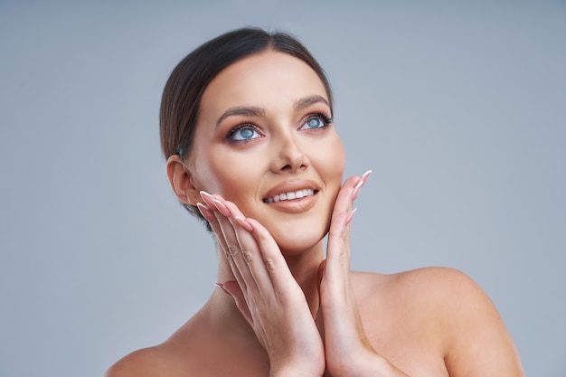 beautiful woman over gray background