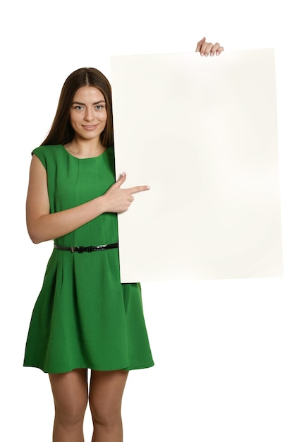 Beautiful woman in green dress with blank banner on white background