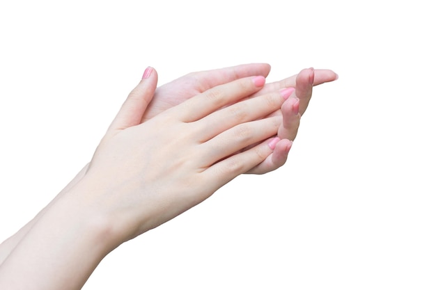 Foto bella donna mano mano femminile che applica lozione o crema per le mani per la cura delle mani nella spa, concetto di manicure