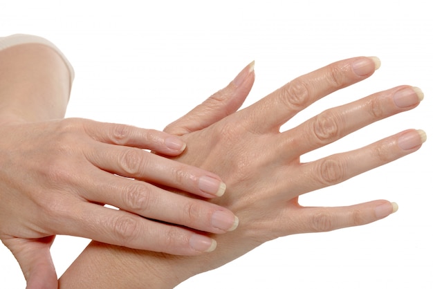 Beautiful woman hands  isolated on white