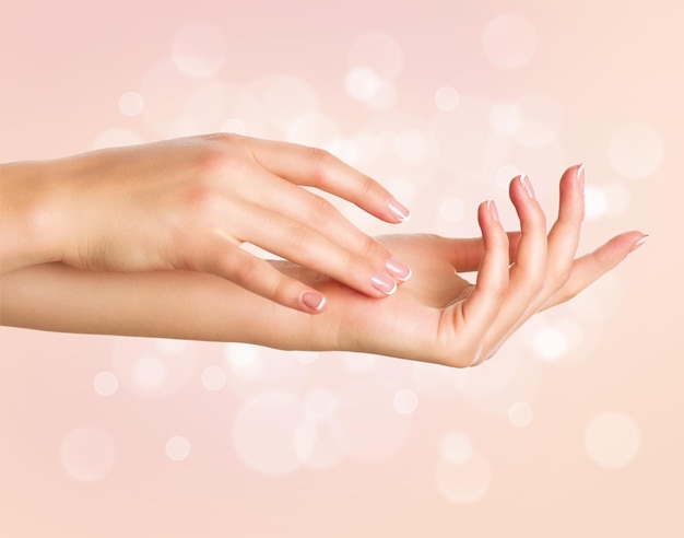 Photo beautiful woman hands spa and manicure concept female hands with french manicure